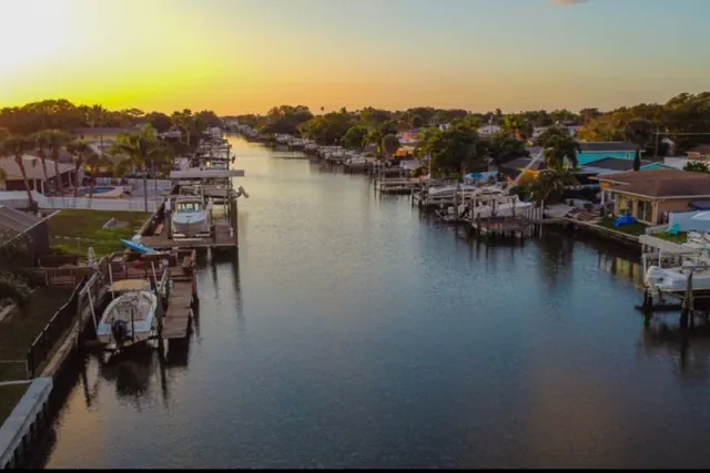 Photo 1 - CANAL Oasis Heated Pool-Hot Tub-Waterfront- Kayaks-Luxury