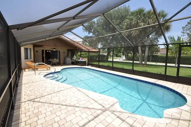 Photo 1 - Salty Breeze Canal Front Pool Home W Boat Dock