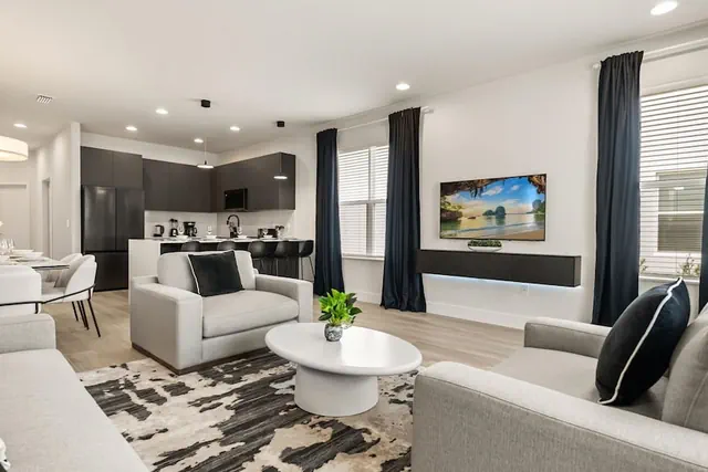 Photo 1 - Contemporary 4BR Townhome With Pool Themed Rooms